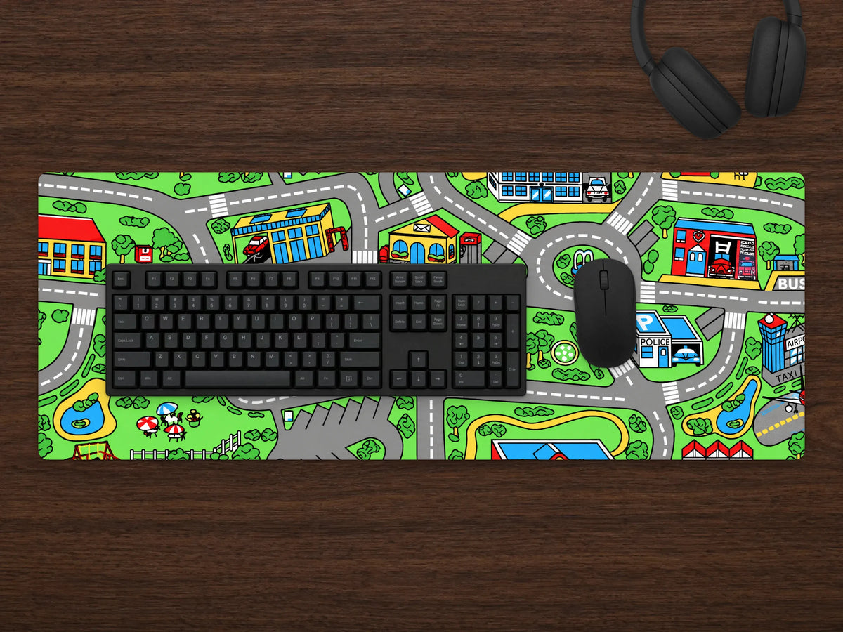 Childhood Mat on a dark walnut desk with a black keyboard, mouse and headphones
